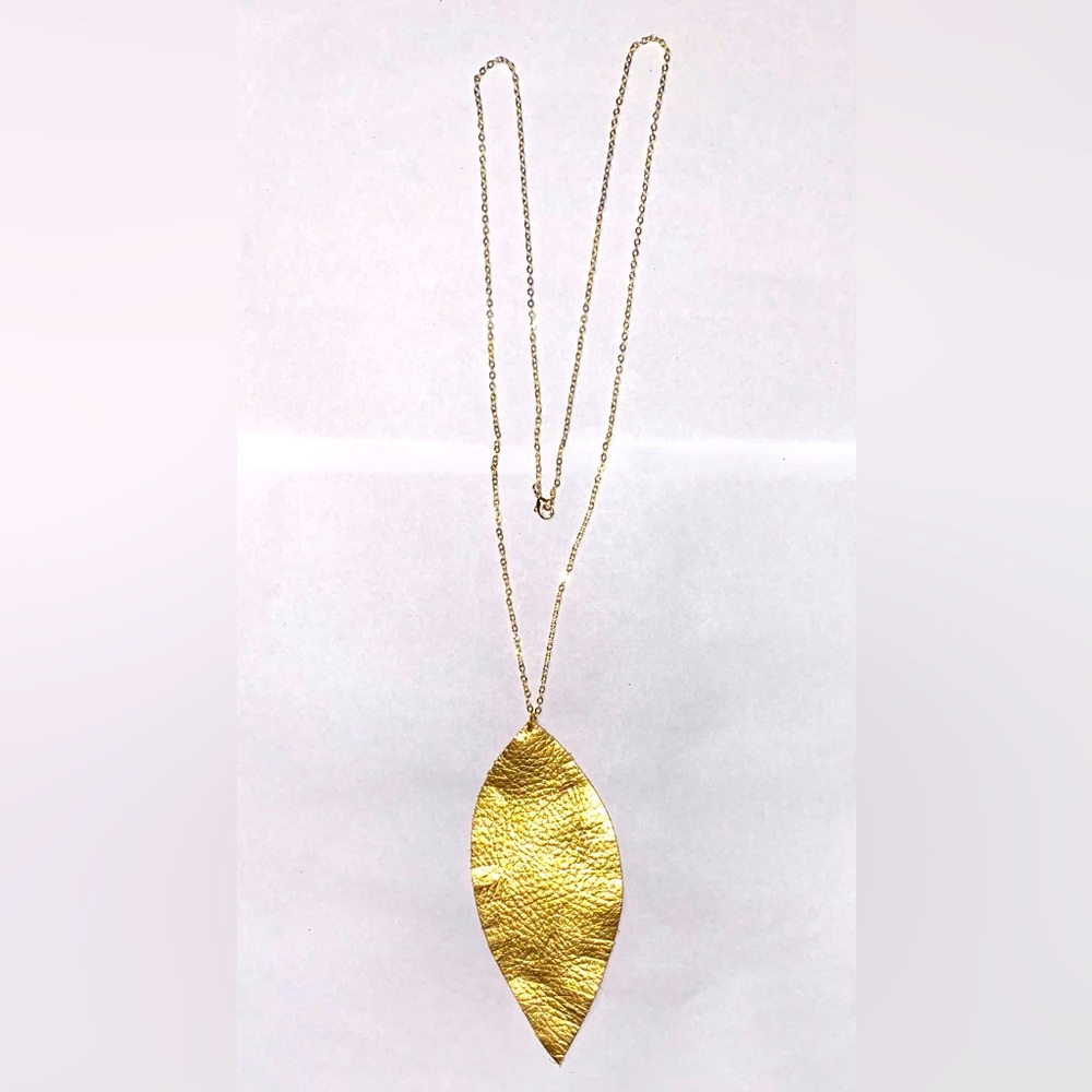 Gold feathered leather teardrop on gold colored chain